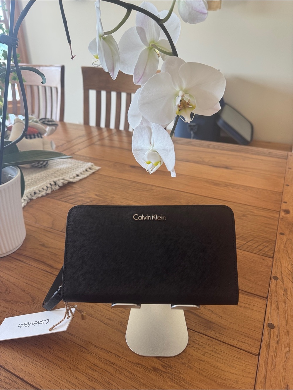 Calvin Klein Black Zip Wallet with Silver Logo